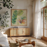 Tropical Delight I by Albena Hristova. Shown in a natural wood frame in a cozy modern living room. Available as an archival giclee rolled canvas, fine art paper, or poster print. SKU 26517a.