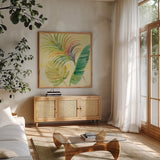 Tropical Delight II by Albena Hristova. Shown in a natural wood frame in a cozy modern living room. Available as an archival giclee rolled canvas, fine art paper, or poster print. SKU 26518a.