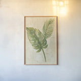 Tropical Leaves Neutral by Albena Hristova. shown as a paper print in a natural frame. Available as a archival giclee rolled canvas, fine art paper, or poster print. SKU 35860h.