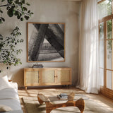 Under the Bridge II Dark Crop by Albena Hristova. Shown in a natural wood frame in a cozy modern living room. Available as an archival giclee rolled canvas, fine art paper, or poster print. SKU 68429a.