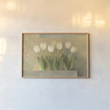 White Tulips Crop by Albena Hristova. shown as a paper print in a natural frame. Available as a archival giclee rolled canvas, fine art paper, or poster print. SKU 6384i.