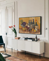 Wine and Fruit I v2 by Albena Hristova. shown as a framed stretched canvas in a living room above a console. Available as a archival giclee rolled canvas, fine art paper, or poster print. SKU 49937i.