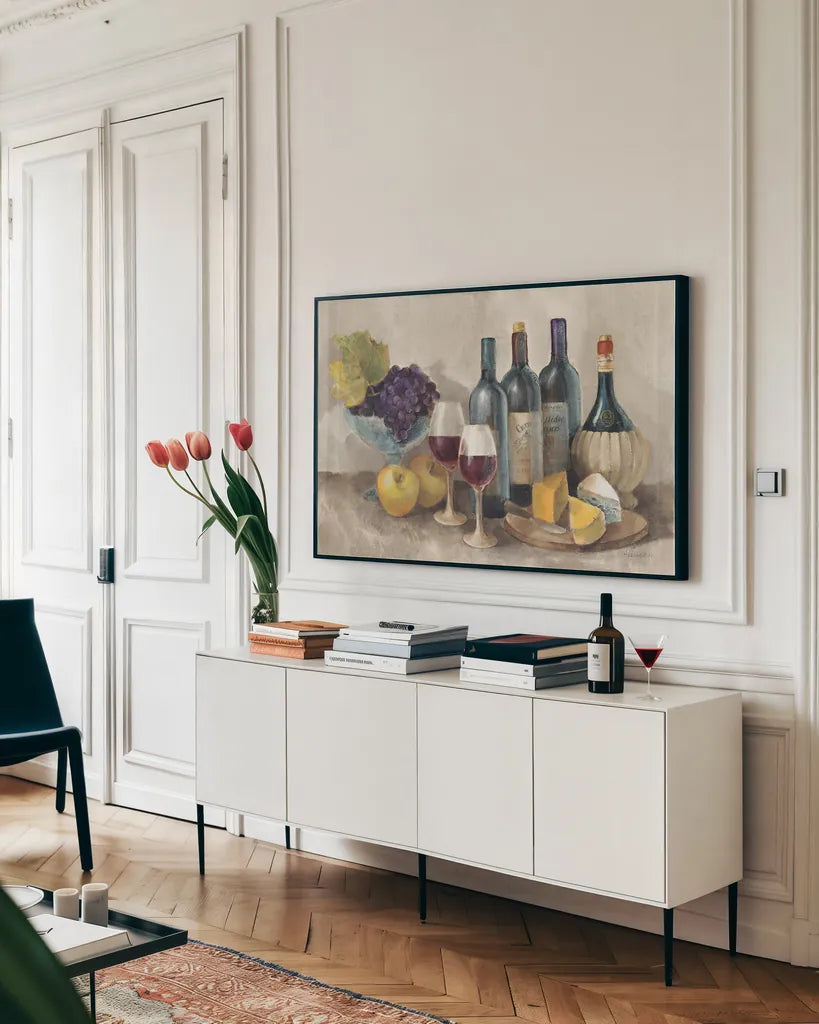 Wine and Fruit I v2 Light by Albena Hristova. shown as a framed stretched canvas in a living room above a console. Available as a archival giclee rolled canvas, fine art paper, or poster print. SKU 51870i.