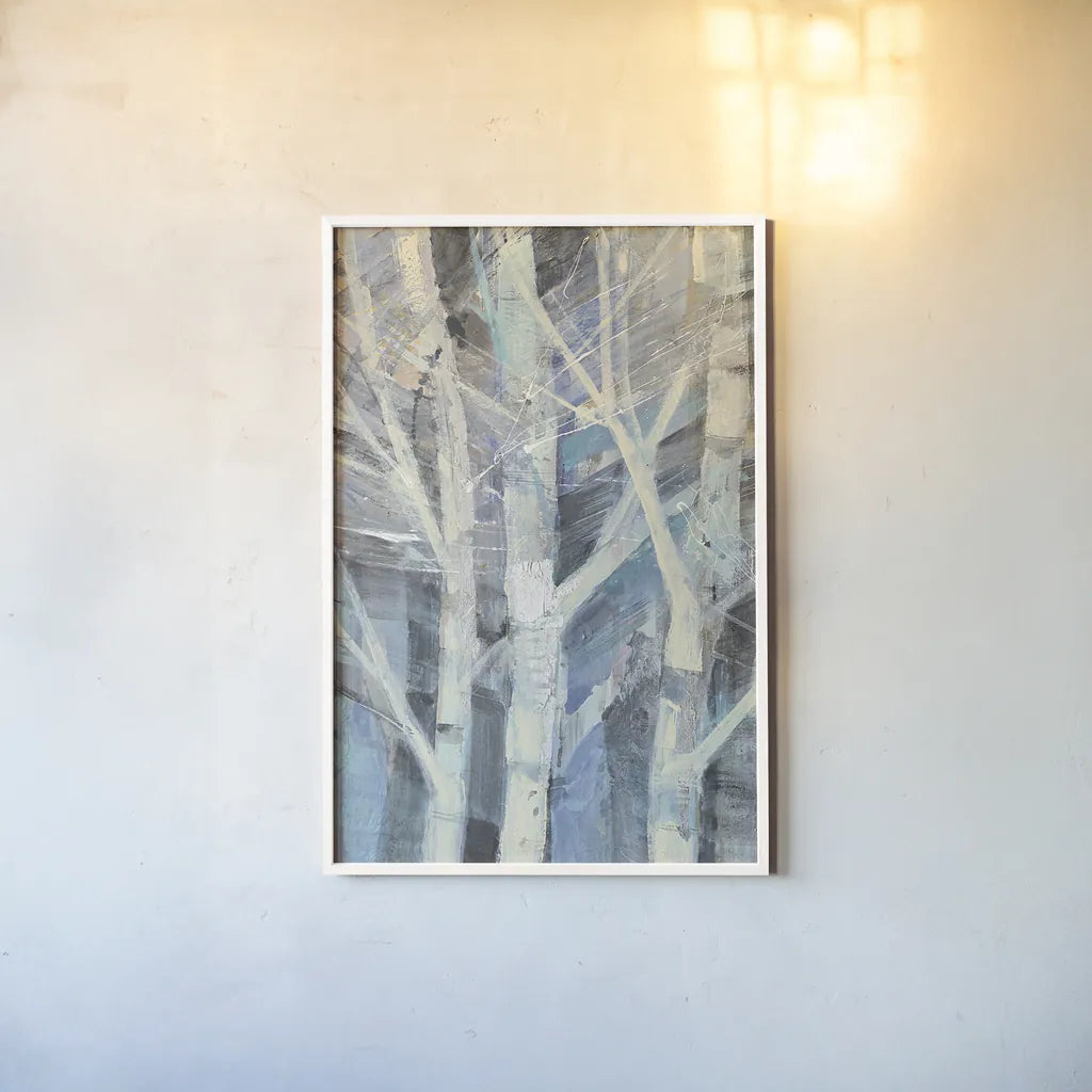 Winter Birches I by Albena Hristova. shown as a paper print in a white frame. Available as a archival giclee rolled canvas, fine art paper, or poster print. SKU 23891h.