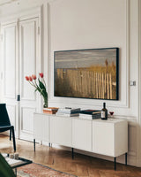 Along the Fence I by Aledanda. shown as a framed stretched canvas in a living room above a console. Available as a archival giclee rolled canvas, fine art paper, or poster print. SKU 46208i.