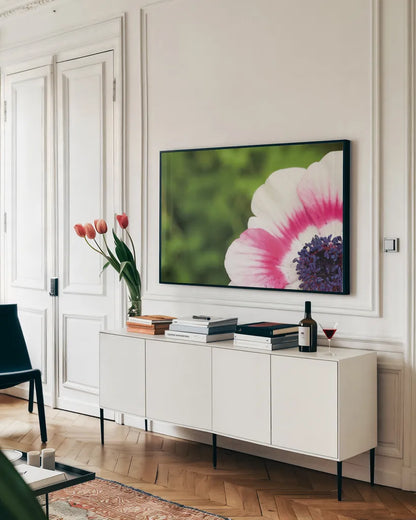 Anemone Blossom II by Aledanda. shown as a framed stretched canvas in a living room above a console. Available as a archival giclee rolled canvas, fine art paper, or poster print. SKU 37466i.