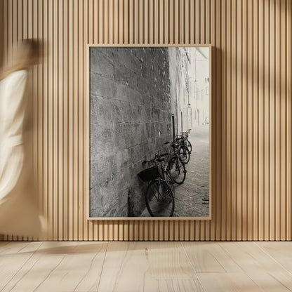 Bicycles in the Alley by Aledanda. shown as over sized large wall art. Available as an archival giclee rolled canvas, fine art paper, or poster print. SKU 67688h.