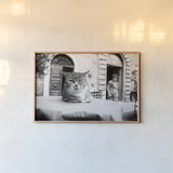 Cafe Cat by Aledanda. shown as a paper print in a natural frame. Available as a archival giclee rolled canvas, fine art paper, or poster print. SKU 101053i.
