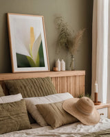 Calla Lily by Aledanda. shown as a paper print in a natural frame. Available as a archival giclee rolled canvas, fine art paper, or poster print. SKU 37463h.