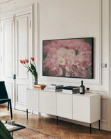 Daisy Dreams by Aledanda. shown as a framed stretched canvas in a living room above a console. Available as a archival giclee rolled canvas, fine art paper, or poster print. SKU 63214i.