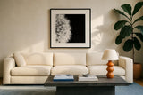 Dandelion on Black II by Aledanda. Displayed in a glass frame with matte in a clean modern living room. Available as an archival giclee rolled canvas, fine art paper, or poster print. SKU 55251a.