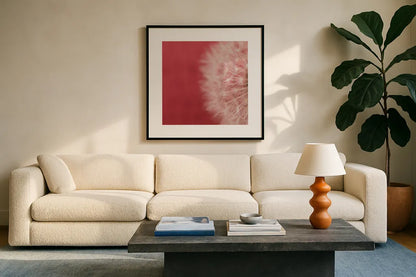 Dandelion on Red II by Aledanda. Displayed in a glass frame with matte in a clean modern living room. Available as an archival giclee rolled canvas, fine art paper, or poster print. SKU 55245a.