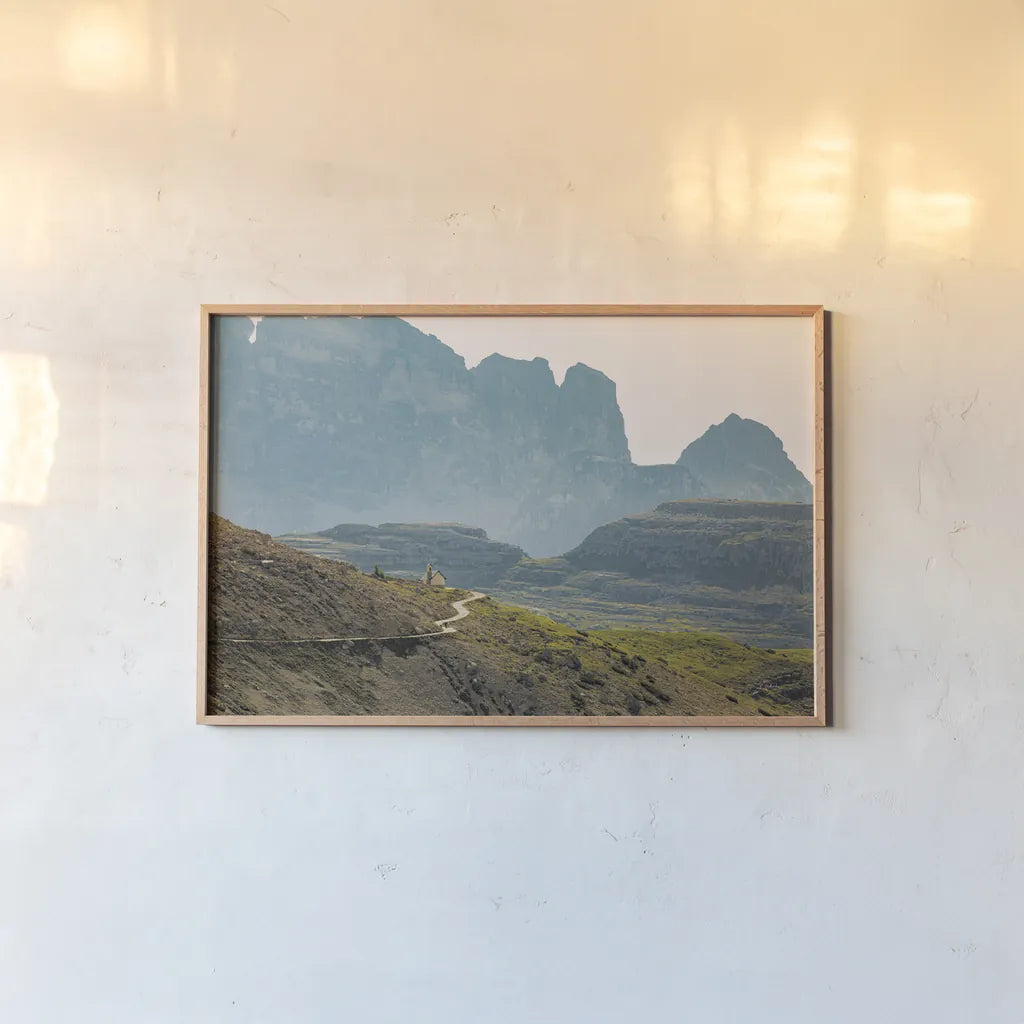 Dolomiti I Color by Aledanda. shown as a paper print in a natural frame. Available as a archival giclee rolled canvas, fine art paper, or poster print. SKU 78130i.