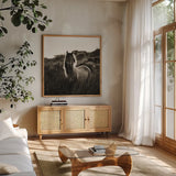 Evening Glow Crop by Aledanda. Shown in a natural wood frame in a cozy modern living room. Available as an archival giclee rolled canvas, fine art paper, or poster print. SKU 38298a.