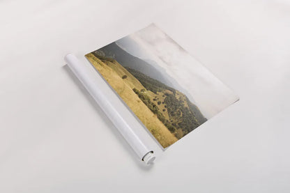 Grassy Hills and Mountains by Aledanda. shown as a rolled paper print. Available as archival giclee rolled canvas, fine art paper, or poster print. SKU 63229i.