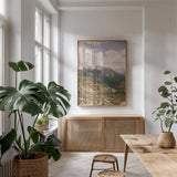 Grassy Mountain Slopes by Aledanda. shown as a print in a natural wood frame in a dining room. Available as a archival giclee rolled canvas, fine art paper, or poster print. SKU 63230h.