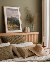 Grassy Mountain Slopes by Aledanda. shown as a paper print in a natural frame. Available as a archival giclee rolled canvas, fine art paper, or poster print. SKU 63230h.