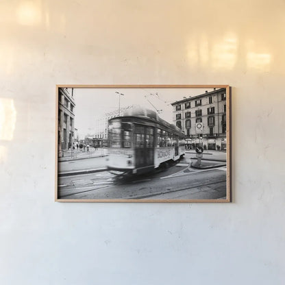 In Town by Aledanda. shown as a paper print in a natural frame. Available as a archival giclee rolled canvas, fine art paper, or poster print. SKU 47849i.