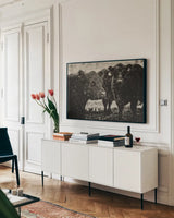 Its Snowing by Aledanda. shown as a framed stretched canvas in a living room above a console. Available as a archival giclee rolled canvas, fine art paper, or poster print. SKU 38317i.
