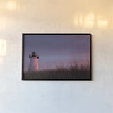 Lighthouse at Sunset Crop by Aledanda. shown as a paper print in a black flame. Available as a archival giclee rolled canvas, fine art paper, or poster print. SKU 46207i.