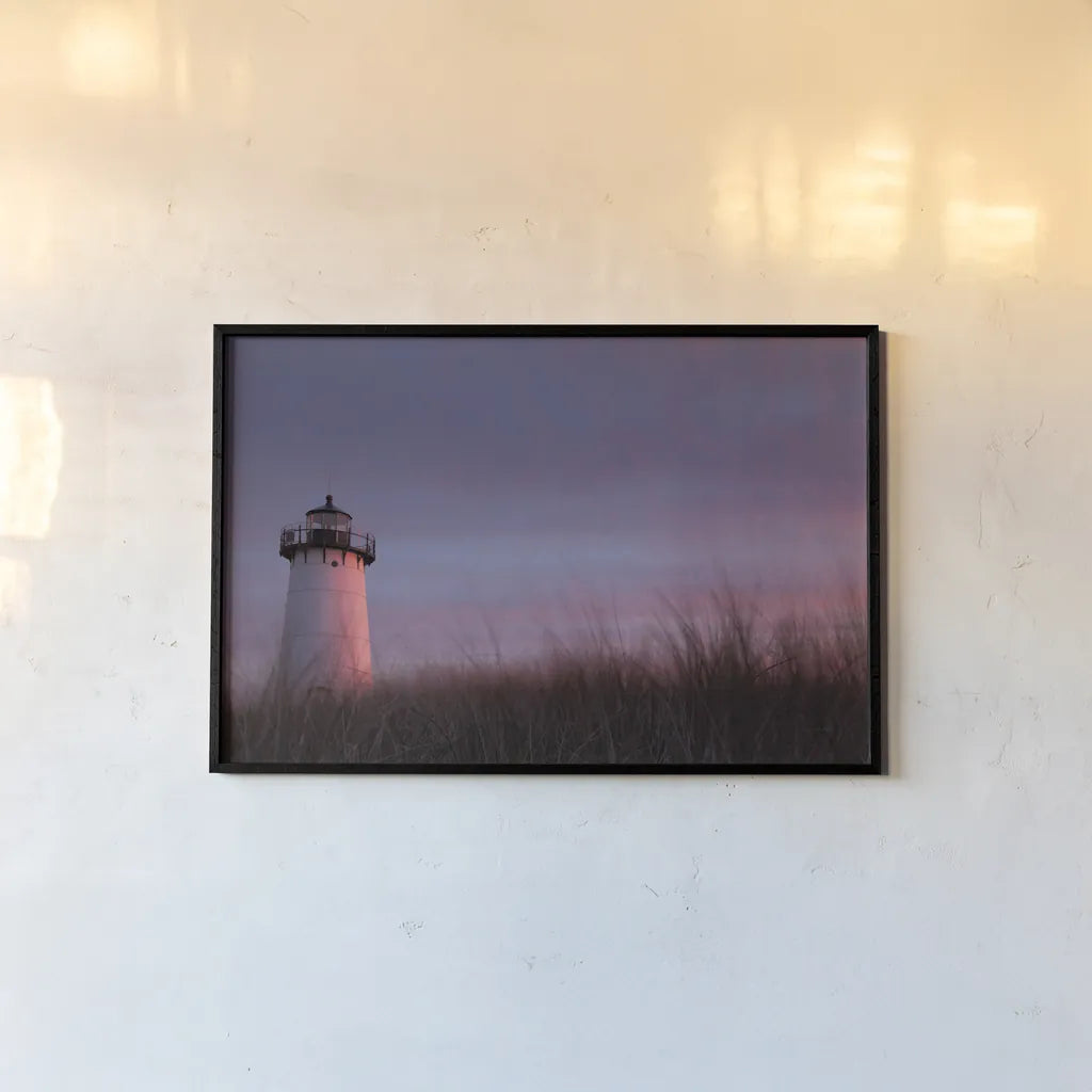 Lighthouse at Sunset Crop by Aledanda. shown as a paper print in a black flame. Available as a archival giclee rolled canvas, fine art paper, or poster print. SKU 46207i.