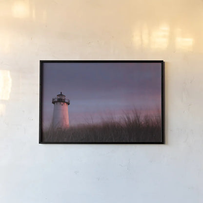 Lighthouse at Sunset Crop by Aledanda. shown as a paper print in a black flame. Available as a archival giclee rolled canvas, fine art paper, or poster print. SKU 46207i.