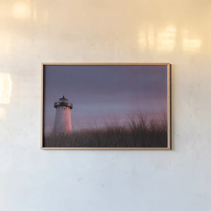 Lighthouse at Sunset Crop by Aledanda. shown as a paper print in a natural frame. Available as a archival giclee rolled canvas, fine art paper, or poster print. SKU 46207i.