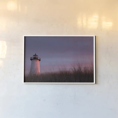 Lighthouse at Sunset Crop by Aledanda. shown as a paper print in a white frame. Available as a archival giclee rolled canvas, fine art paper, or poster print. SKU 46207i.