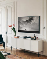 Lone Tree by Aledanda. shown as a framed stretched canvas in a living room above a console. Available as a archival giclee rolled canvas, fine art paper, or poster print. SKU 10151i.