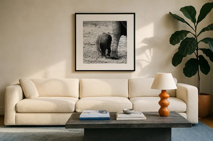 Mama and Baby Elephant II by Aledanda. Displayed in a glass frame with matte in a clean modern living room. Available as an archival giclee rolled canvas, fine art paper, or poster print. SKU 58136a.