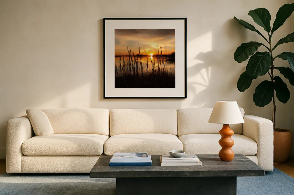Maryland Sunset II by Aledanda. Displayed in a glass frame with matte in a clean modern living room. Available as an archival giclee rolled canvas, fine art paper, or poster print. SKU 52952a.