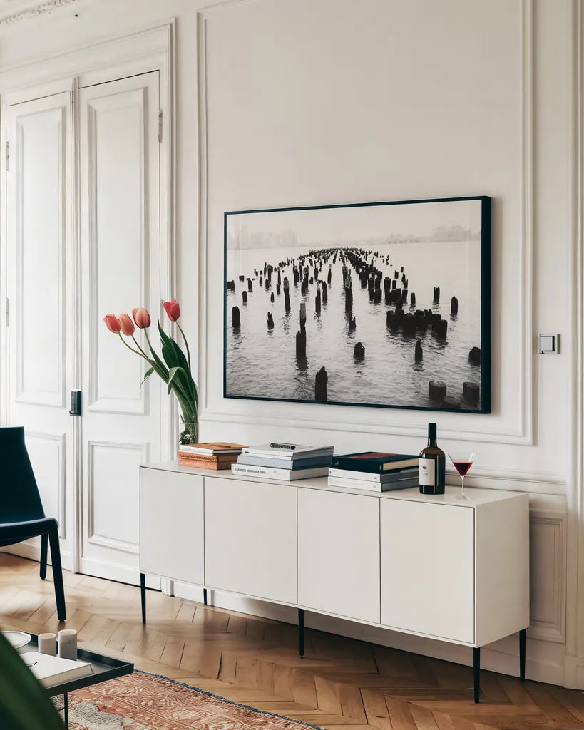 Memory Piers by Aledanda. shown as a framed stretched canvas in a living room above a console. Available as a archival giclee rolled canvas, fine art paper, or poster print. SKU 64373i.