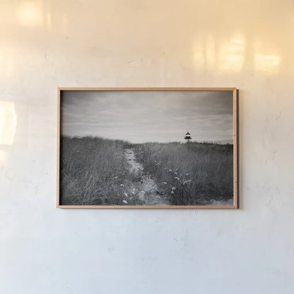 Nantucket Light by Aledanda. shown as a paper print in a natural frame. Available as a archival giclee rolled canvas, fine art paper, or poster print. SKU 64374i.