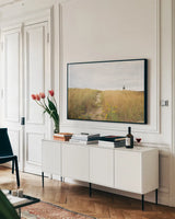 Nantucket Light Color by Aledanda. shown as a framed stretched canvas in a living room above a console. Available as a archival giclee rolled canvas, fine art paper, or poster print. SKU 77228i.