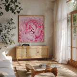 Pale Pink Peony by Aledanda. Shown in a natural wood frame in a cozy modern living room. Available as an archival giclee rolled canvas, fine art paper, or poster print. SKU 37453a.
