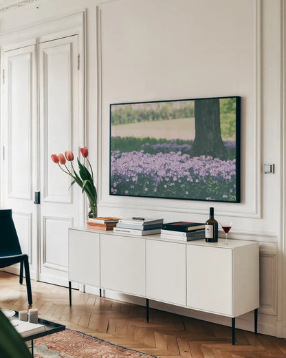 Phlox in the Shade by Aledanda. shown as a framed stretched canvas in a living room above a console. Available as a archival giclee rolled canvas, fine art paper, or poster print. SKU 63218i.