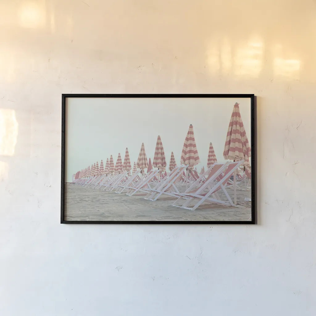 Pink Umbrellas by Aledanda. shown as a paper print in a black flame. Available as a archival giclee rolled canvas, fine art paper, or poster print. SKU 82460i.