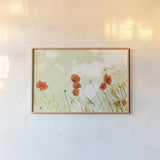 Poppies and Sky by Aledanda. shown as a paper print in a natural frame. Available as a archival giclee rolled canvas, fine art paper, or poster print. SKU 72740i.
