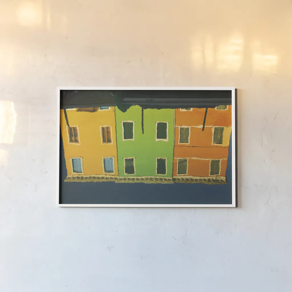 Reflections of Burano IX by Aledanda. shown as a paper print in a white frame. Available as a archival giclee rolled canvas, fine art paper, or poster print. SKU 41602i.