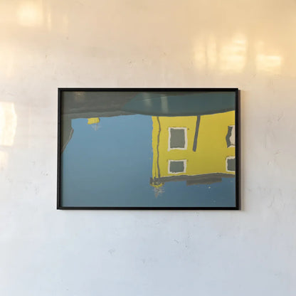 Reflections of Burano VIII by Aledanda. shown as a paper print in a black flame. Available as a archival giclee rolled canvas, fine art paper, or poster print. SKU 41601i.