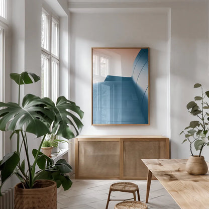 Skyscaper VIII Bright by Aledanda. shown as a print in a natural wood frame in a dining room. Available as a archival giclee rolled canvas, fine art paper, or poster print. SKU 80373h.