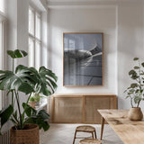 Skyscraper VII by Aledanda. shown as a print in a natural wood frame in a dining room. Available as a archival giclee rolled canvas, fine art paper, or poster print. SKU 53647h.