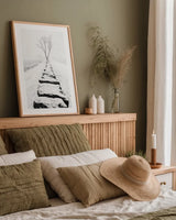 Snowy Stone Wall by Aledanda. shown as a paper print in a natural frame. Available as a archival giclee rolled canvas, fine art paper, or poster print. SKU 64380h.