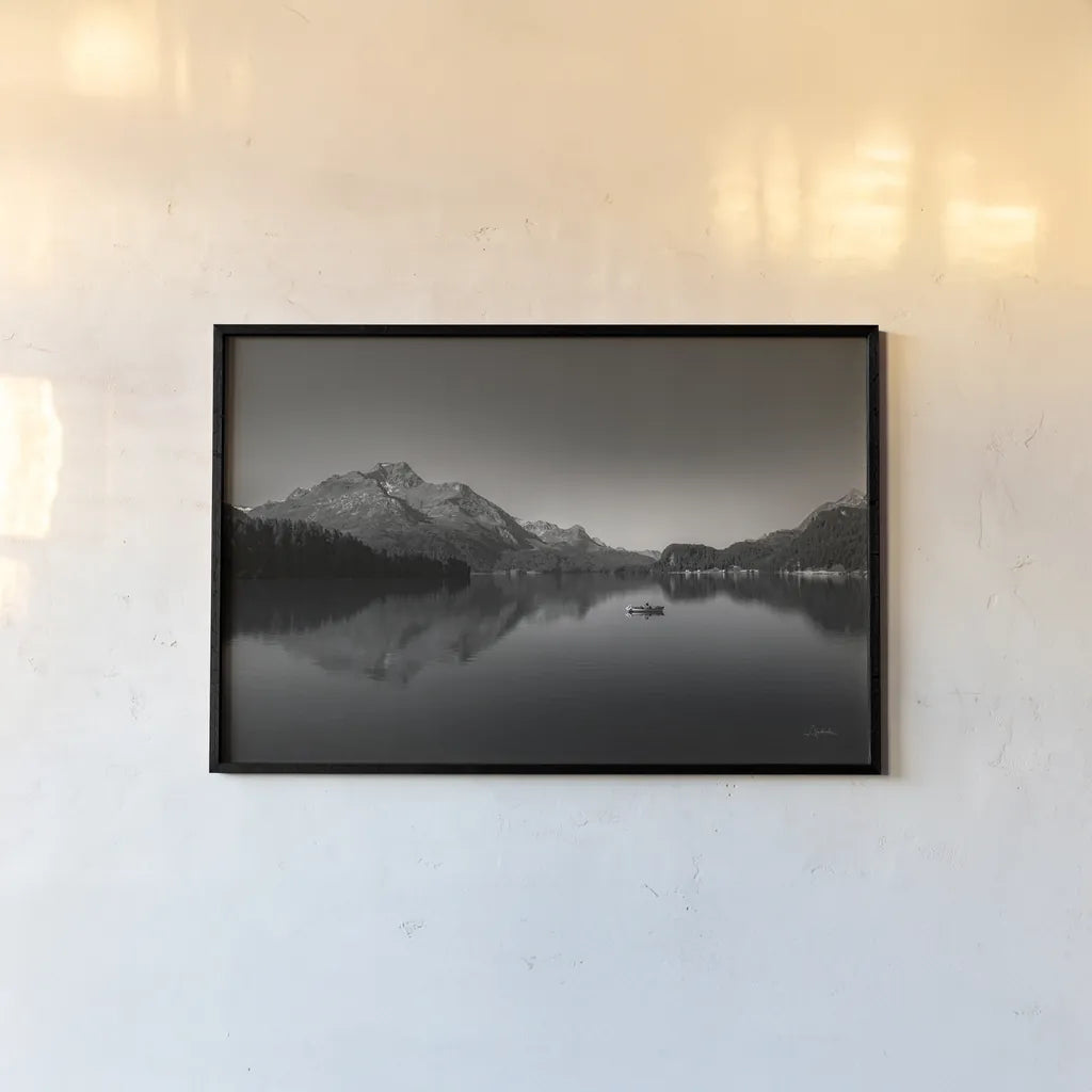 Solo Fishing by Aledanda. shown as a paper print in a black flame. Available as a archival giclee rolled canvas, fine art paper, or poster print. SKU 75862i.