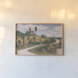 Strada Bianca I by Aledanda. shown as a paper print in a natural frame. Available as a archival giclee rolled canvas, fine art paper, or poster print. SKU 47847i.