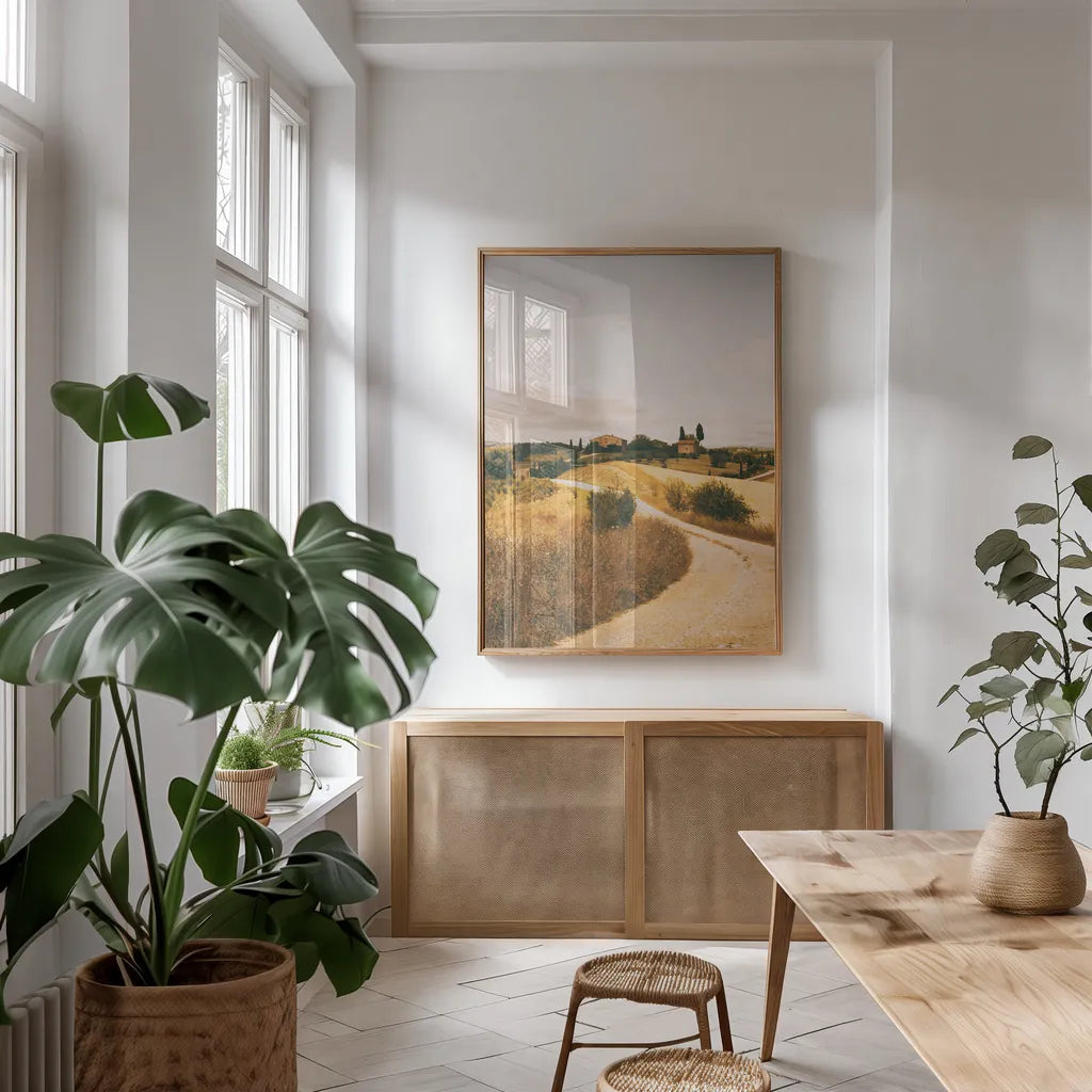 Strada Bianca II by Aledanda. shown as a print in a natural wood frame in a dining room. Available as a archival giclee rolled canvas, fine art paper, or poster print. SKU 47848h.