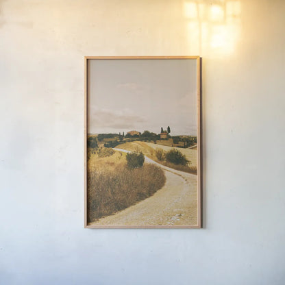 Strada Bianca II by Aledanda. shown as a paper print in a natural frame. Available as a archival giclee rolled canvas, fine art paper, or poster print. SKU 47848h.