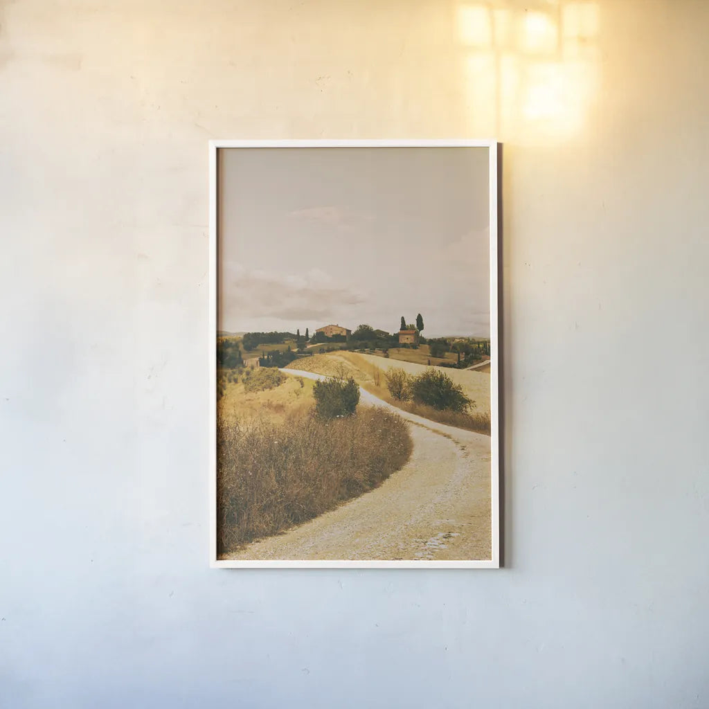 Strada Bianca II by Aledanda. shown as a paper print in a white frame. Available as a archival giclee rolled canvas, fine art paper, or poster print. SKU 47848h.