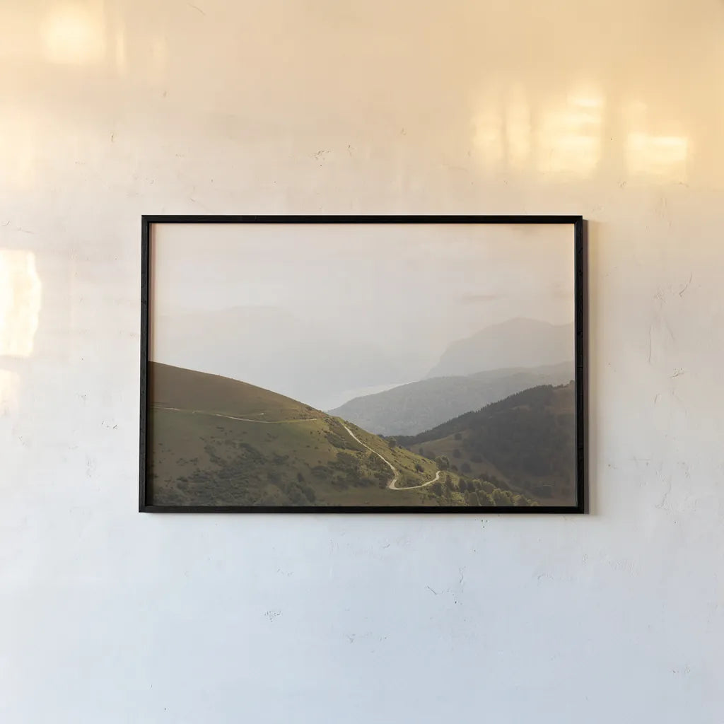 The Pass by Aledanda. shown as a paper print in a black flame. Available as a archival giclee rolled canvas, fine art paper, or poster print. SKU 63232i.