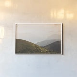 The Pass by Aledanda. shown as a paper print in a white frame. Available as a archival giclee rolled canvas, fine art paper, or poster print. SKU 63232i.